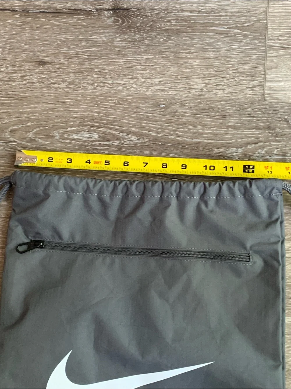 Nike Gray Drawstring Backpack with White Swoosh